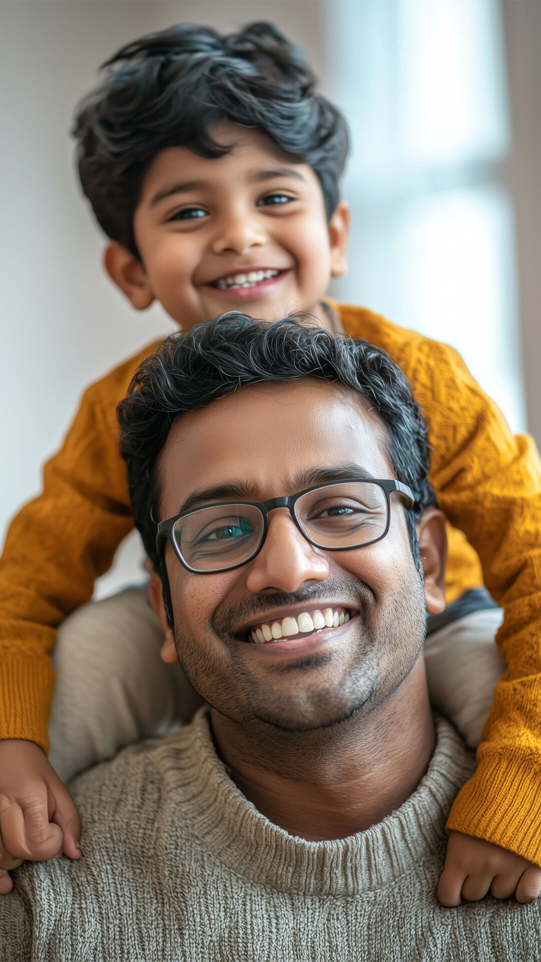 Son sitting on fathers shoulder